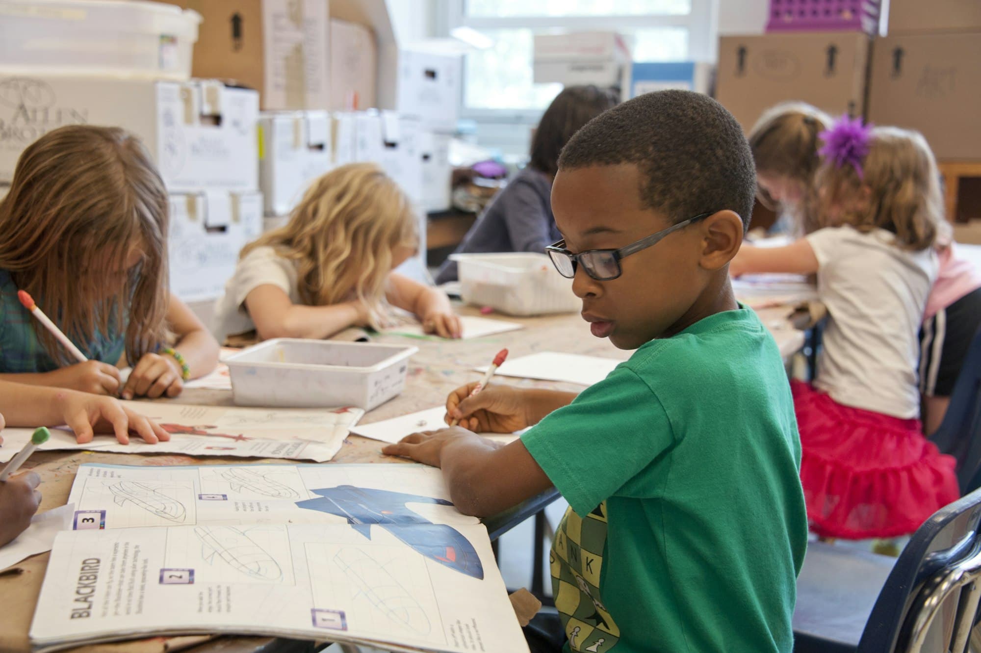 Children working together at their desks